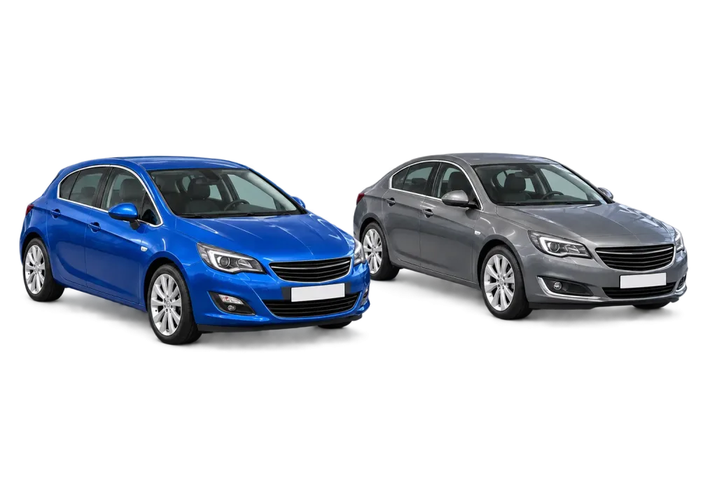 Два автомобиля Opel рядом с рабочими местами мастерской